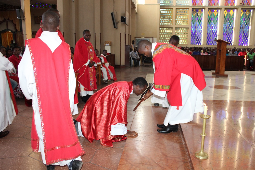 Kneeling before the cross pic